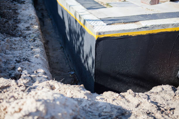 Professional Waterproofing technician working in Brick, NJ